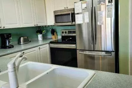Recently remodeled food prep area in small beach condo kitchen.